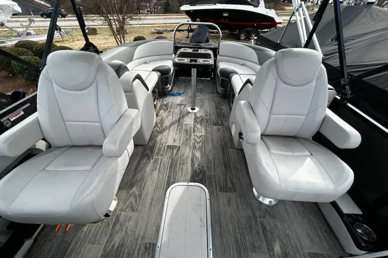 Slide: The Image of 2022 Tahoe Pontoon LTZ Quad Lounger with luxurious seating and modern design. - 13