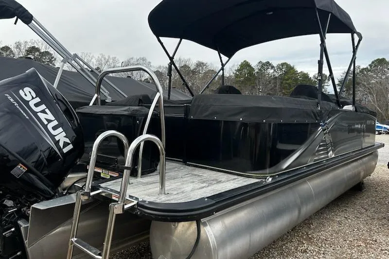 Slide: The Image of 2022 Tahoe Pontoon LTZ Quad Lounger with Suzuki engine, featuring a sleek design and canopy. - 3