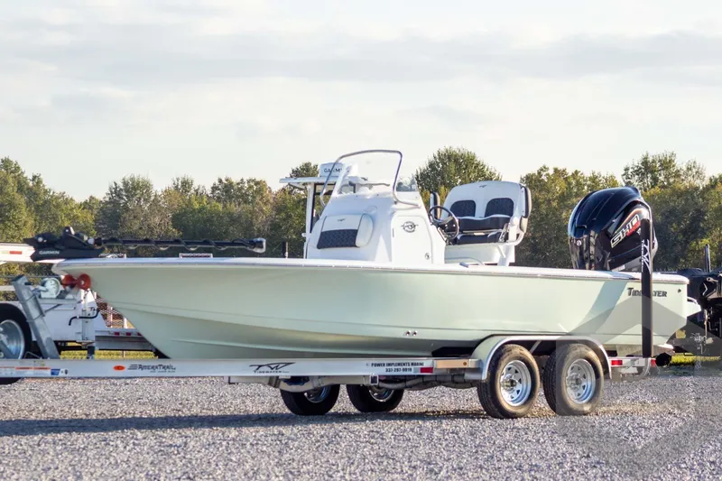 The Image of 2026 Tidewater 2110 Bay Max boat on trailer, parked outdoors. - 1