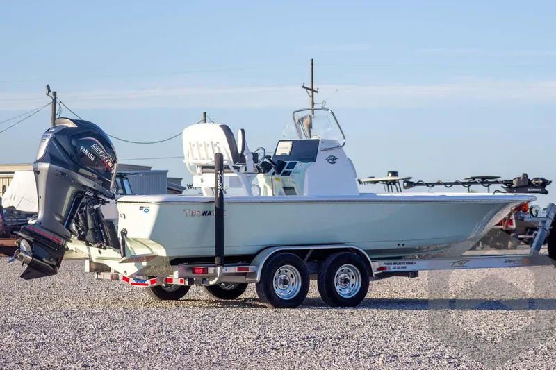 Slide: The Image of 2026 Tidewater 2110 Bay Max boat on trailer with Yamaha outboard motor. - 11