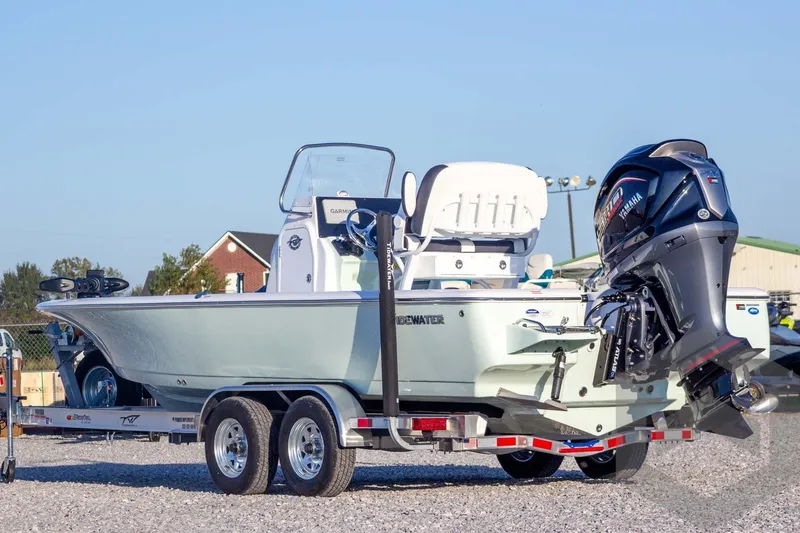 Slide: The Image of 2026 Tidewater 2110 Bay Max boat on trailer with Yamaha outboard motor. - 15