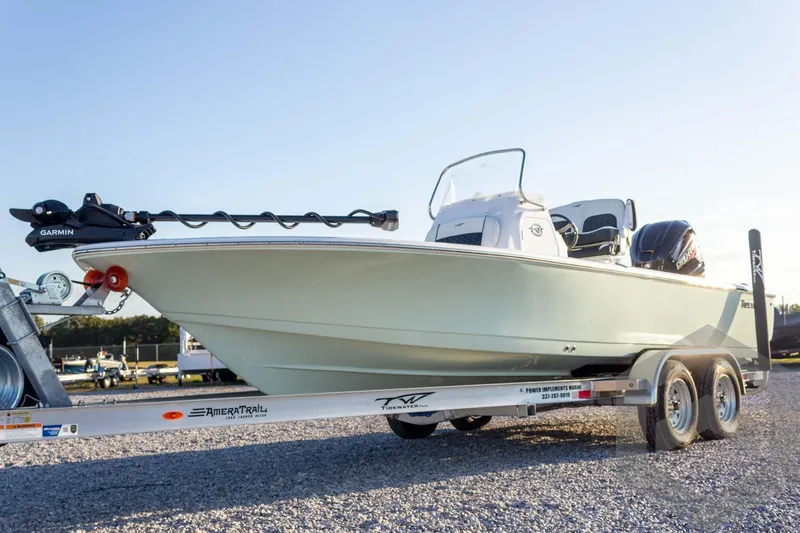 Slide: The Image of 2026 Tidewater 2110 Bay Max boat on trailer, featuring Garmin equipment. - 19