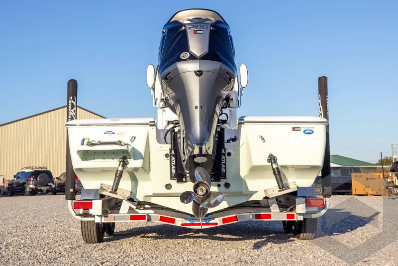 Slide: The Image of 2026 Tidewater 2110 Bay Max boat rear view with powerful outboard motor. - 24