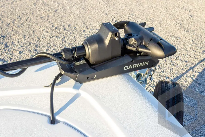 Slide: The Image of Garmin device on 2026 Tidewater 2110 Bay Max boat, gravel background. - 44