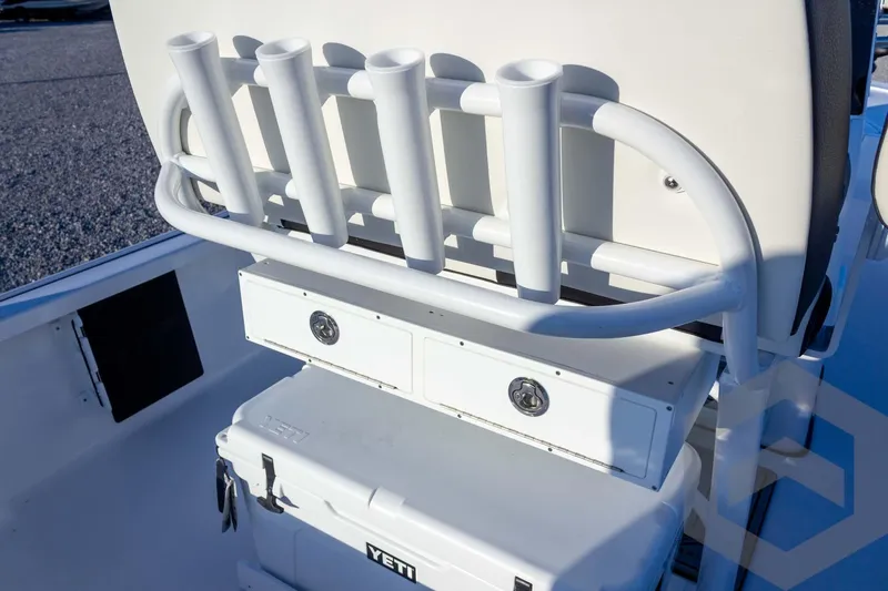 Slide: The Image of 2026 Tidewater 2110 Bay Max boat with rod holders and Yeti cooler. - 50