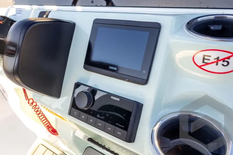 Slide: The Image of 2026 Tidewater 2110 Bay Max dashboard with Yamaha display and Fusion audio system. - 55