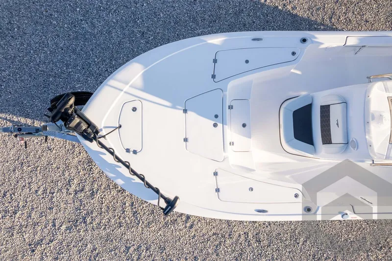 Slide: The Image of Top view of 2026 Tidewater 2110 Bay Max boat on gravel surface. - 64