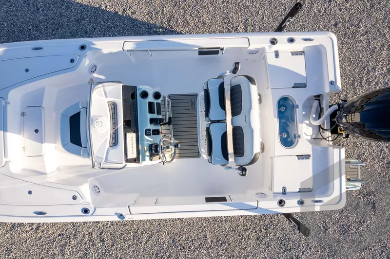 Slide: The Image of Overhead view of 2026 Tidewater 2110 Bay Max boat interior and controls. - 65