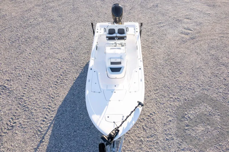 Slide: The Image of 2026 Tidewater 2110 Bay Max boat on gravel surface, aerial view. - 74