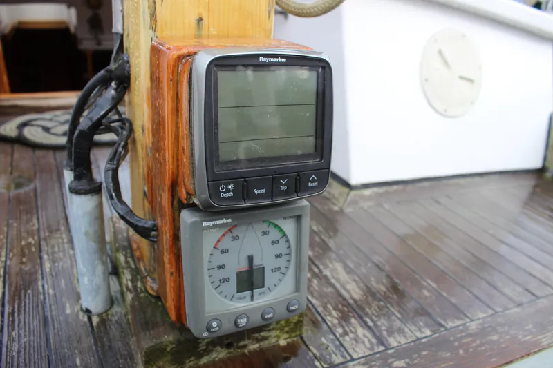 Slide: The Image of Raymarine navigation instruments on 1975 William Garden Porpoise boat deck. - 13