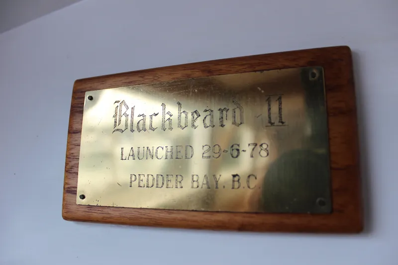Slide: The Image of Plaque reading "Blackbeard II, Launched 29-6-78, Pedder Bay, B.C." on wooden backing. - 37