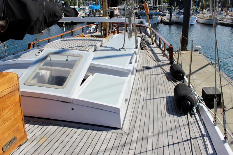 Slide: The Image of Deck of 1975 William Garden Porpoise sailboat docked at marina. - 8