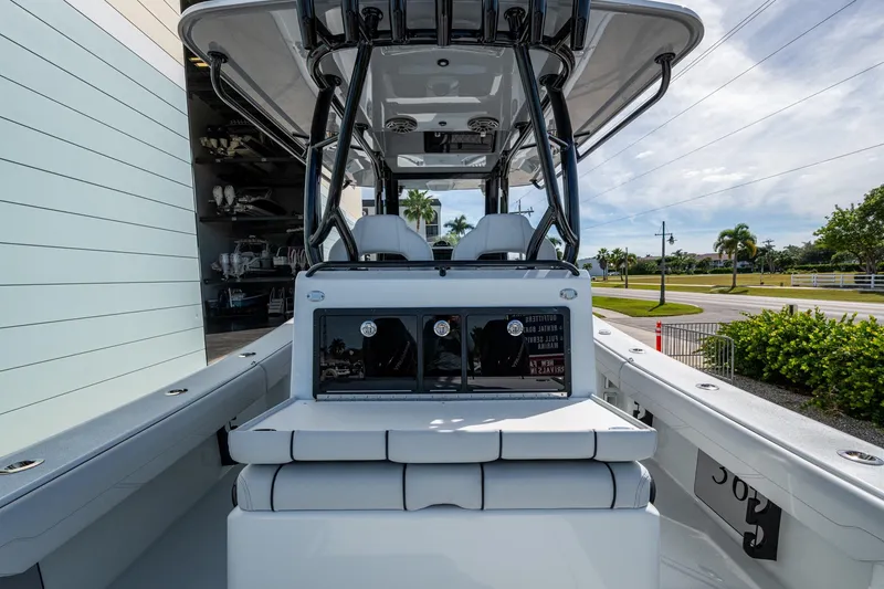 Slide: The Image of 2026 Yellowfin 36 Offshore boat interior with seating and console, showcasing modern design. - 14