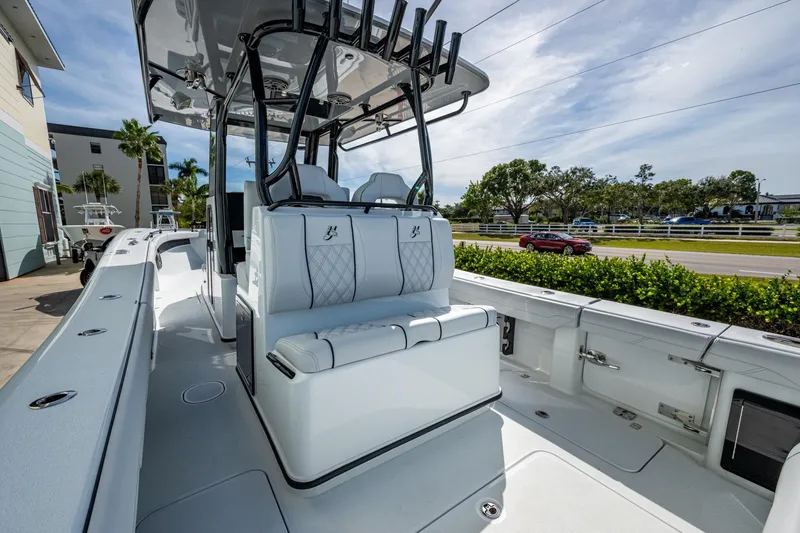 Slide: The Image of 2026 Yellowfin 36 Offshore boat interior with sleek seating and modern design. - 16