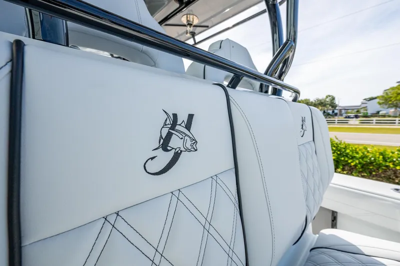 Slide: The Image of 2026 Yellowfin 36 Offshore boat with embroidered white leather seats. - 17