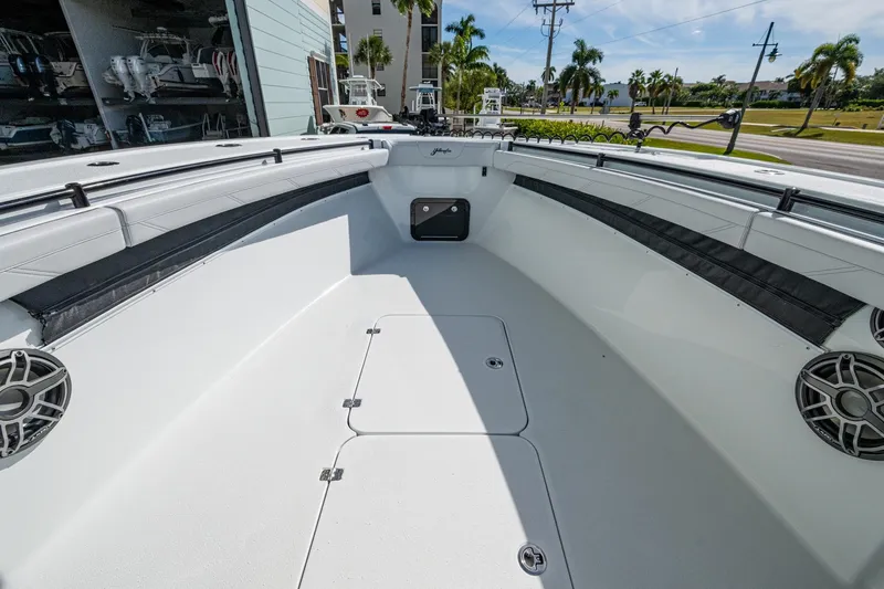 Slide: The Image of 2026 Yellowfin 36 Offshore boat interior with spacious deck and modern speakers. - 23