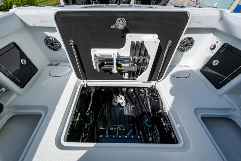 Slide: The Image of 2026 Yellowfin 36 Offshore boat interior, showcasing open hatch with mechanical components. - 34