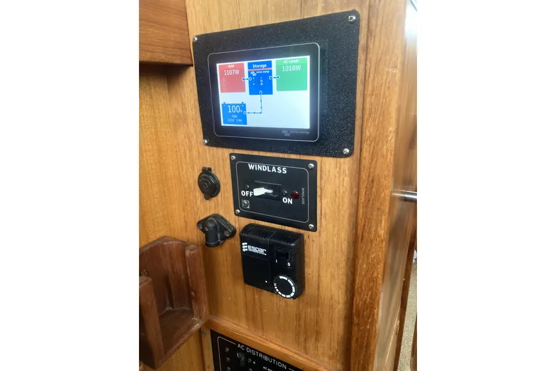 Slide: The Image of Control panel on 1984 Nauticat 33 boat with digital display and windlass switch. - 48