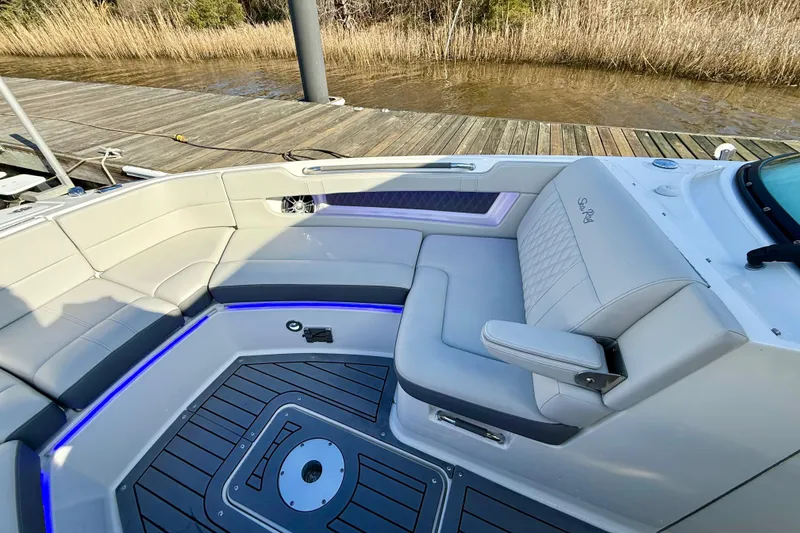 Slide: The Image of Luxurious interior of 2021 Sea Ray SLX 310 Outboard boat with elegant seating. - 34