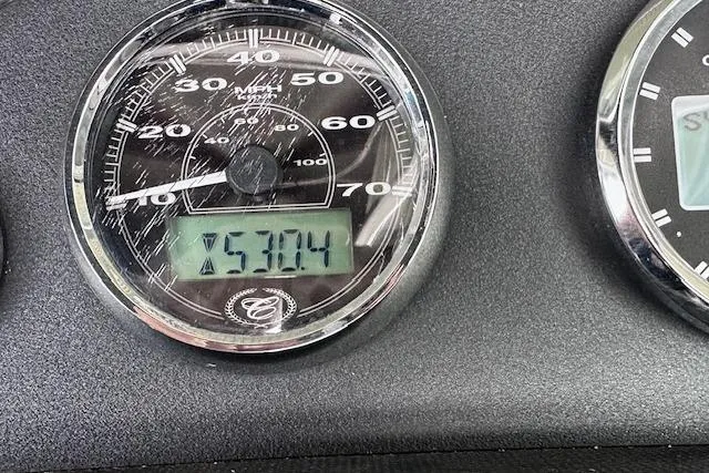 Slide: The Image of Speedometer of 2011 Cobalt 242 WSS showing 53.04 MPH with scratches. - 17