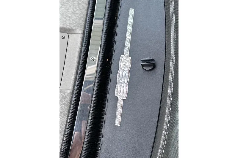 Slide: The Image of Close-up of 2011 Cobalt 242 WSS boat interior with logo detail. - 22