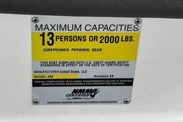 Slide: The Image of Capacity label for 2011 Cobalt 242 WSS boat, max 13 people or 2000 lbs. - 26