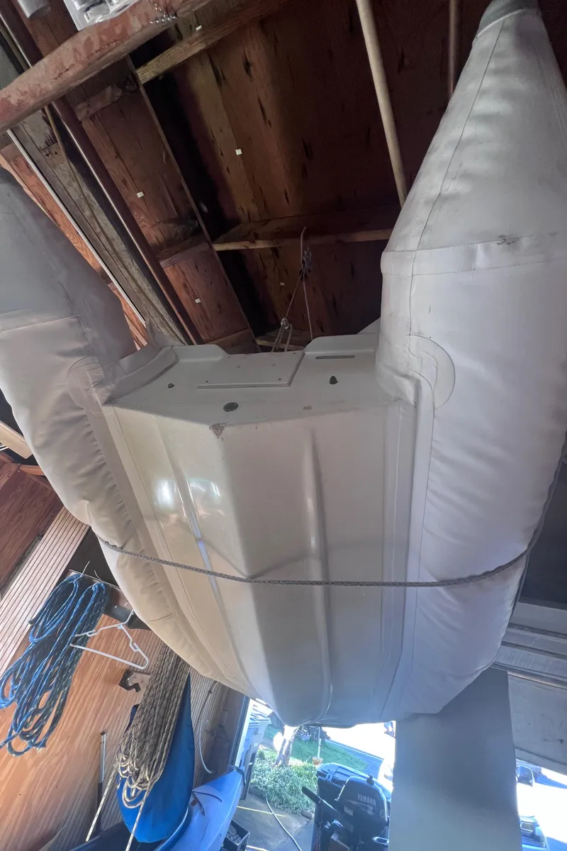 Slide: The Image of 1989 Catalina 36 boat hull in storage, viewed from below. - 22