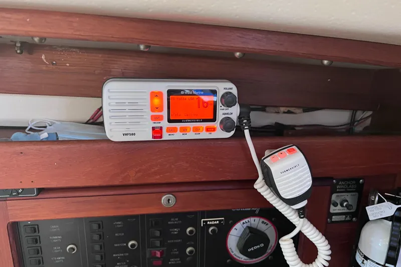 Slide: The Image of VHF radio system on 1989 Catalina 36 sailboat dashboard. - 33