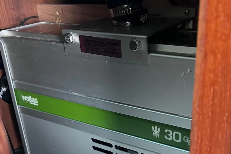Slide: The Image of Wallas 30 heater inside a 1989 Catalina 36 sailboat. - 35