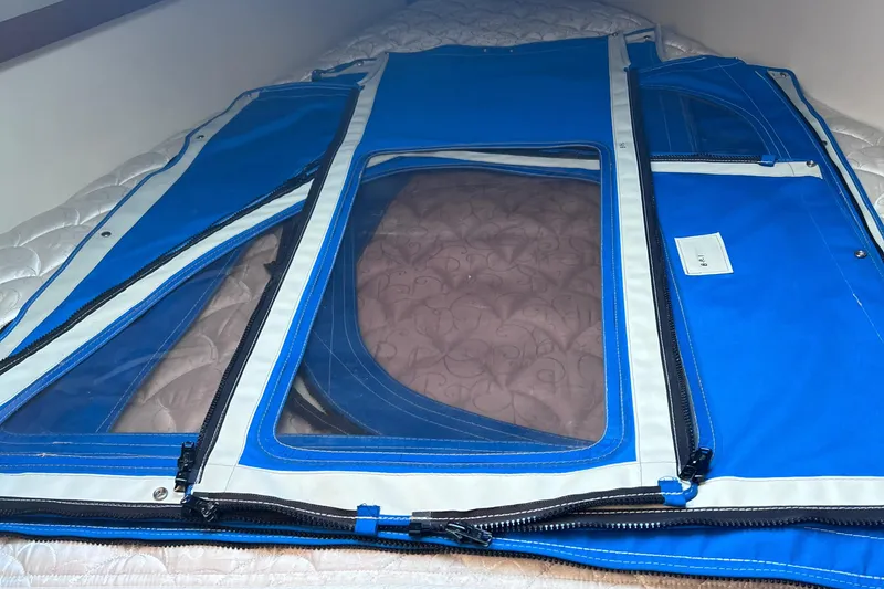 Slide: The Image of Blue canvas cover with clear windows for 1989 Catalina 36 sailboat. - 39