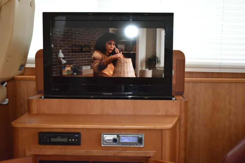 Slide: The Image of Entertainment cabinet houses the ac/dc breaker panel and generator control panel. - 29