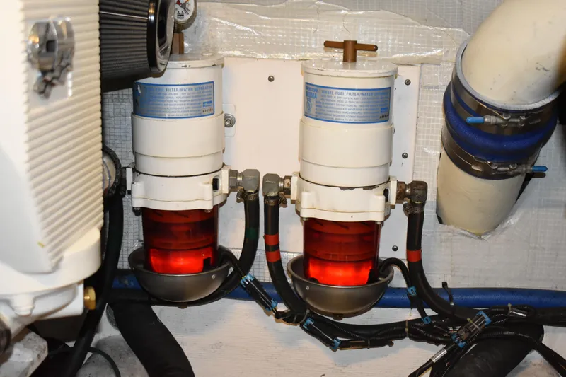 Slide: The Image of 2011 Sabre 42 Salon Express yacht docked at marina under blue sky. - 63