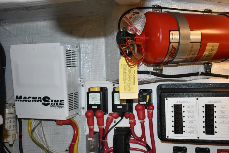 Slide: The Image of 2011 Sabre 42 Salon Express yacht in dry dock, under a protective canopy. - 65