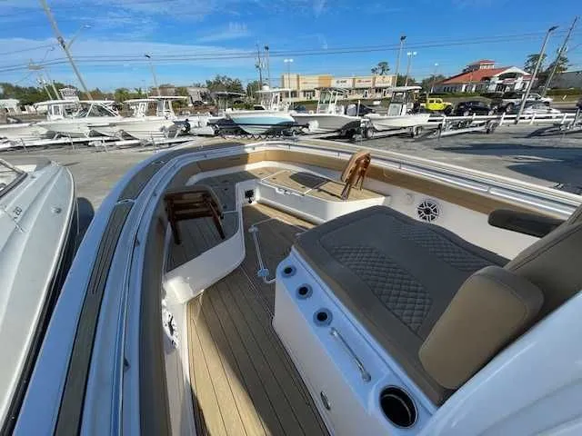 Slide: The Image of Interior view of Caymas 291HB boat, 2026 model, docked at marina. - 11