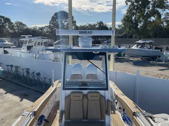 Slide: The Image of 2026 Caymas 291HB boat with Simrad equipment in harbor. - 14