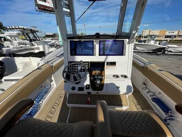 Slide: The Image of Interior of 2026 Caymas 291HB with modern helm console. - 6