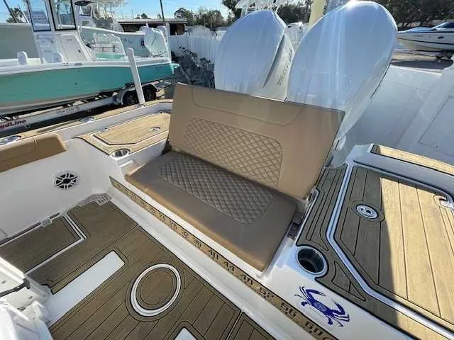 Slide: The Image of Caymas 291HB 2026 boat featuring luxurious seating and modern design. - 9