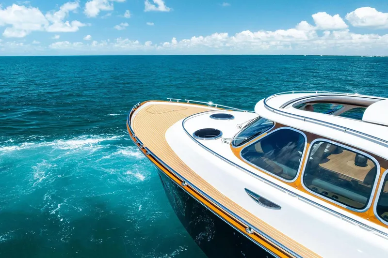 Slide: The Image of 2019 Zeelander Z55 yacht cruising on open blue ocean under clear skies. - 14