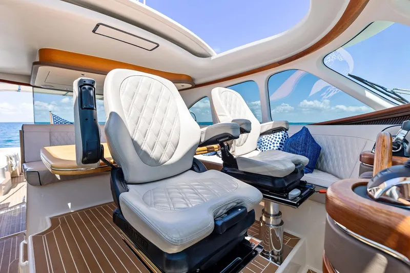 Slide: The Image of Luxurious interior of 2019 Zeelander Z55 yacht with plush seating and ocean view. - 31