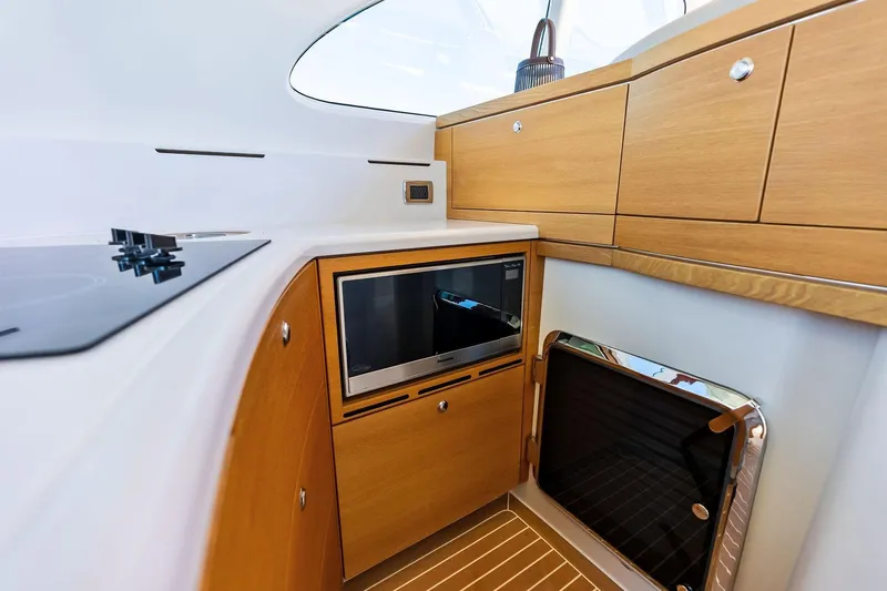 Slide: The Image of Luxurious interior of 2019 Zeelander Z55 yacht with modern kitchen amenities. - 37