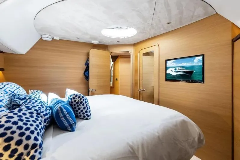 Slide: The Image of Luxurious 2019 Zeelander Z55 yacht bedroom with modern decor and TV. - 45