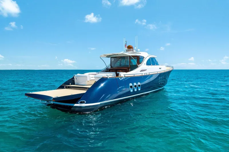 Slide: The Image of 2019 Zeelander Z55 yacht on clear blue ocean under sunny sky. - 5