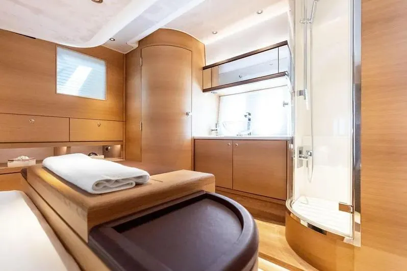 Slide: The Image of Luxurious interior of 2019 Zeelander Z55 yacht with elegant wood finishes and modern amenities. - 50