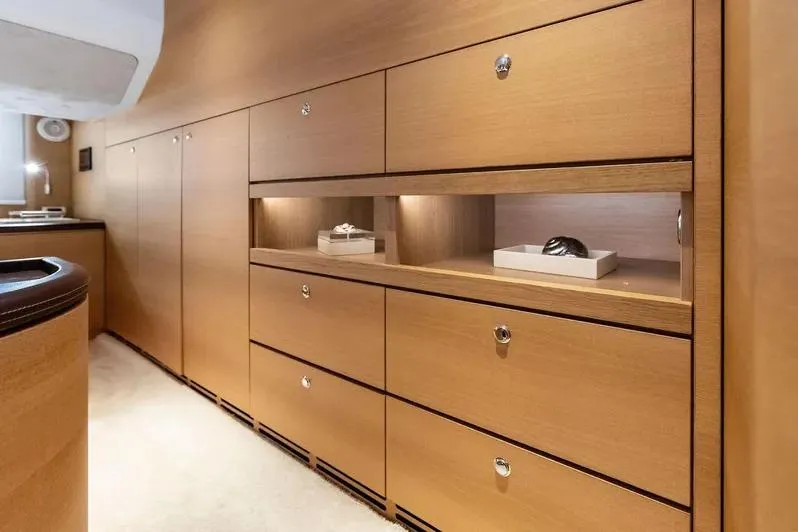Slide: The Image of Luxurious wooden cabinetry inside 2019 Zeelander Z55 yacht, featuring sleek design and ample storage. - 51