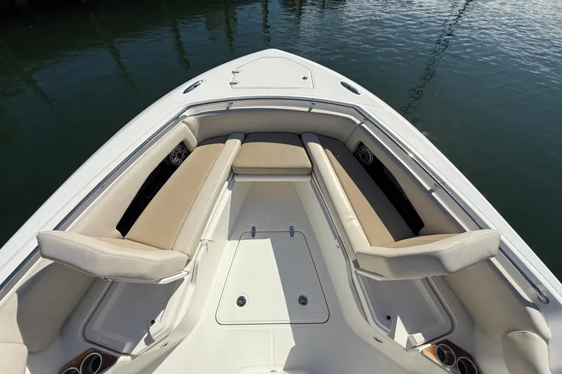 Slide: The Image of 2023 Boston Whaler 360 Outrage boat with spacious bow seating and elegant design. - 10