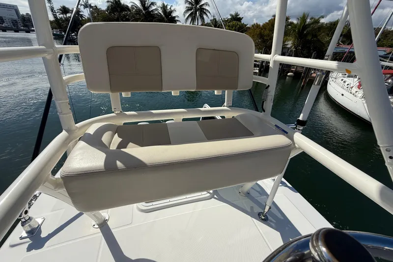 Slide: The Image of Boston Whaler 360 Outrage 2023 seating area with water view. - 24