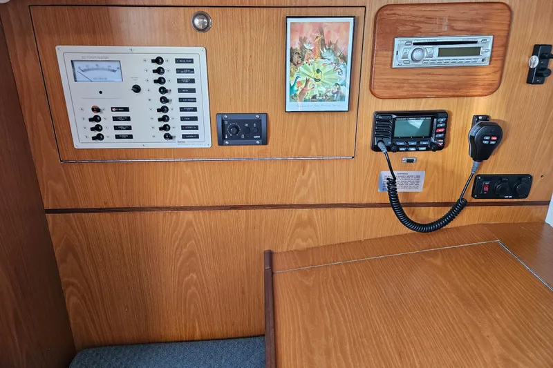 Slide: The Image of Control panel of a 2001 Farr 395 yacht with radio and audio system. - 15