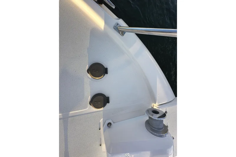 Slide: The Image of 2002 Bayliner 3988 Command Bridge Motoryacht deck with cleat and fittings. - 20