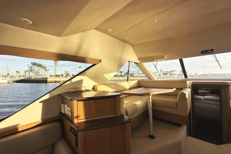 Slide: The Image of Interior of 2002 Bayliner 3988 Command Bridge Motoryacht with elegant seating and scenic views. - 34