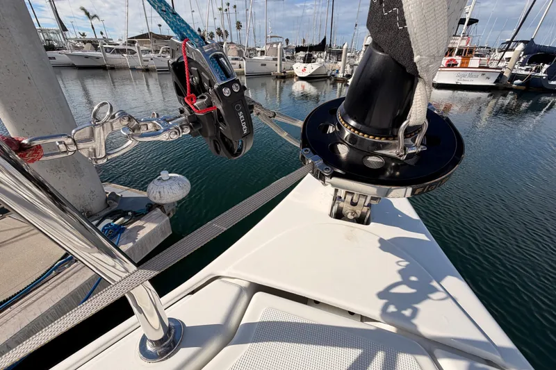 Slide: The Image of Bow of 2025 Jeanneau Sun Odyssey 350 sailboat docked in marina. - 30